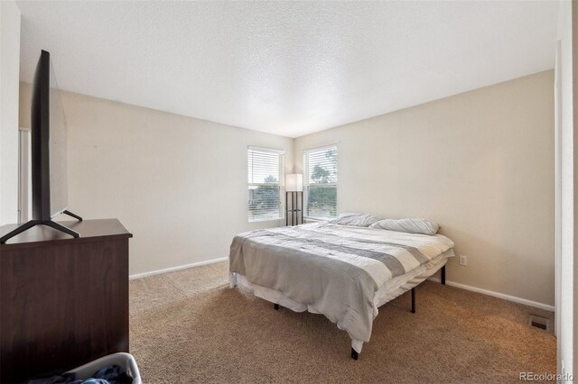 9316 Harrison St, Thornton, CO 80229 - carpeted bedroom featuring baseboards