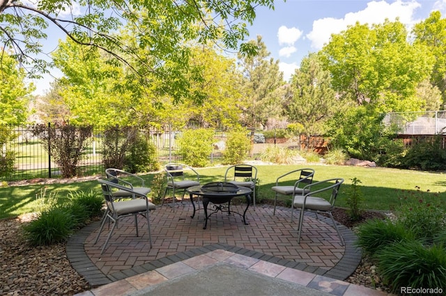 3935 Pierson St, Wheat Ridge, CO 80033 - view of patio featuring an outdoor fire pit