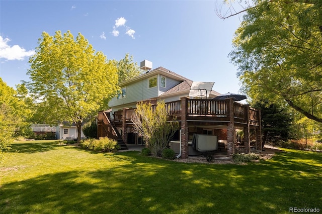 3935 Pierson St, Wheat Ridge, CO 80033 - rear view of property featuring stairs, a deck, and a lawn