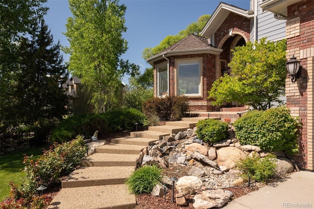 3935 Pierson St, Wheat Ridge, CO 80033 - view of exterior entry with brick siding