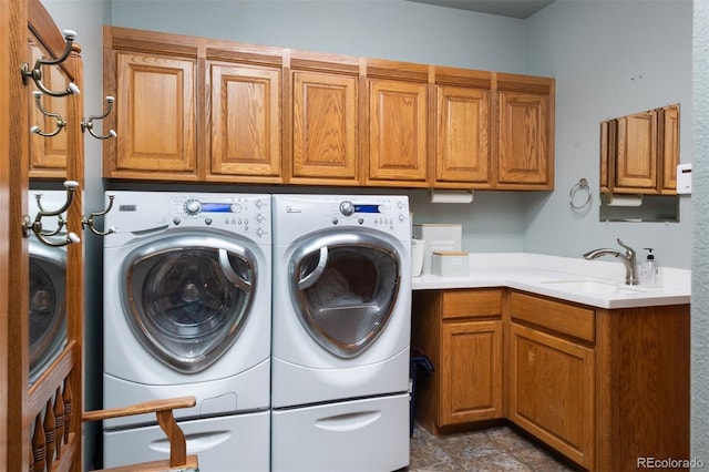 3935 Pierson St, Wheat Ridge, CO 80033 - washroom with cabinet space and separate washer and dryer