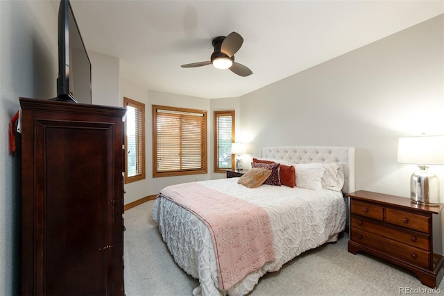 3935 Pierson St, Wheat Ridge, CO 80033 - bedroom with light carpet and a ceiling fan