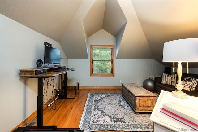 3935 Pierson St, Wheat Ridge, CO 80033 - home office featuring lofted ceiling and wood finished floors