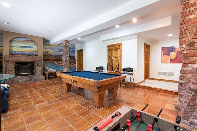 3935 Pierson St, Wheat Ridge, CO 80033 - playroom with light tile patterned floors, a glass covered fireplace, pool table, recessed lighting, and ornate columns
