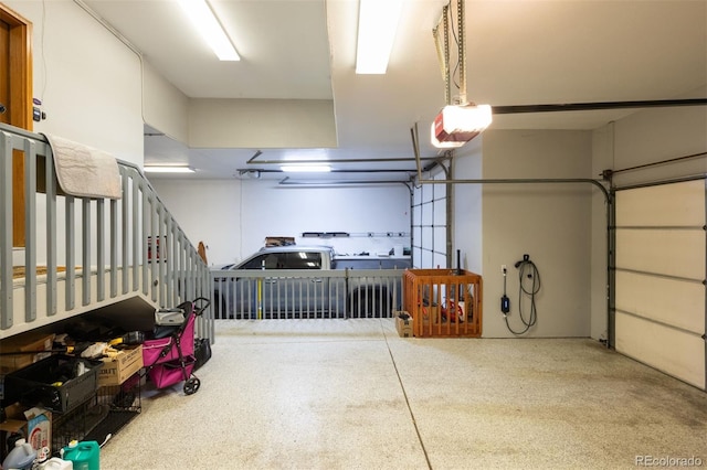 3935 Pierson St, Wheat Ridge, CO 80033 - garage featuring a garage door opener