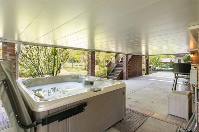 3935 Pierson St, Wheat Ridge, CO 80033 - view of patio / terrace featuring stairs and a hot tub