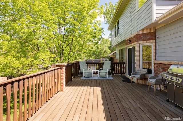 3935 Pierson St, Wheat Ridge, CO 80033 - wooden terrace with area for grilling