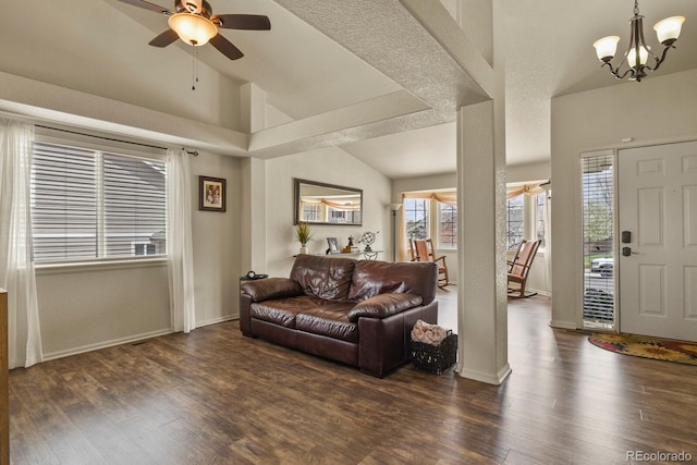 1457 Rosedale St, Castle Rock, CO 80104 - living area featuring dark wood-type flooring, high vaulted ceiling, a chandelier, ceiling fan, and baseboards