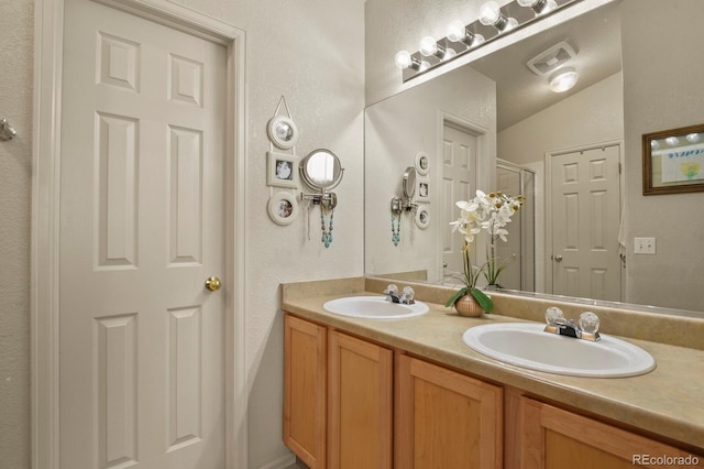 1457 Rosedale St, Castle Rock, CO 80104 - full bathroom with a stall shower and double vanity