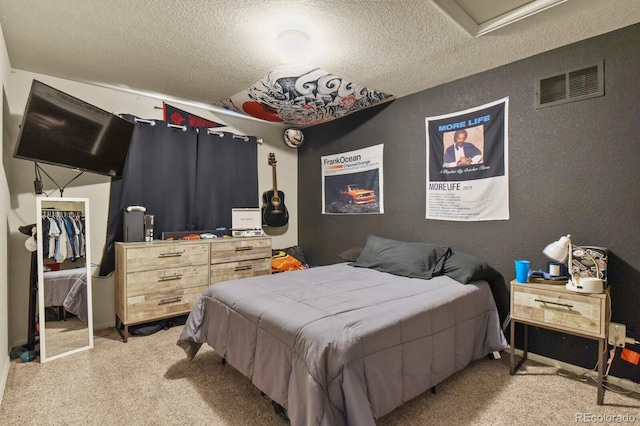 1457 Rosedale St, Castle Rock, CO 80104 - bedroom with a textured ceiling, light colored carpet, attic access, and a textured wall