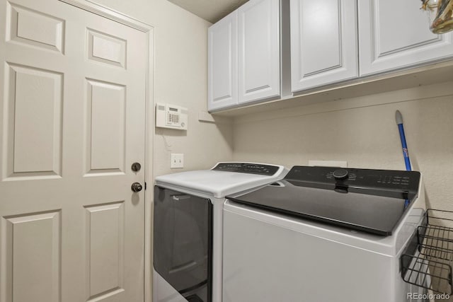 1457 Rosedale St, Castle Rock, CO 80104 - laundry room with cabinet space and washer and clothes dryer
