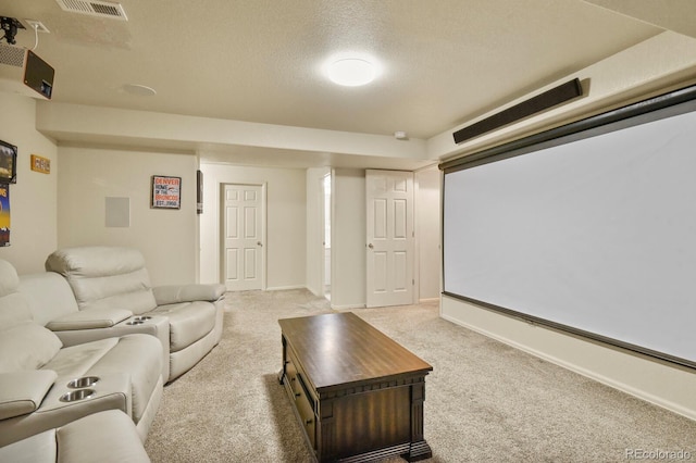 1457 Rosedale St, Castle Rock, CO 80104 - home theater room featuring light colored carpet, a textured ceiling, and baseboards