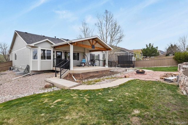 1457 Rosedale St, Castle Rock, CO 80104 - rear view of property with a fire pit and a wooden deck