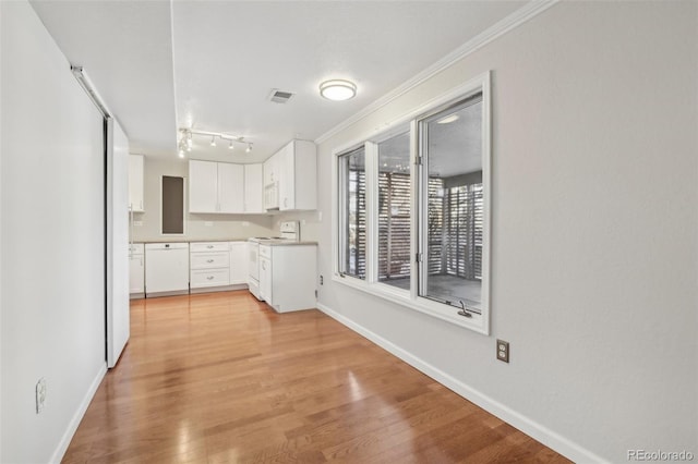 kitchen featuring white cabinets, white appliances, crown molding, and light hardwood / wood-style flooring