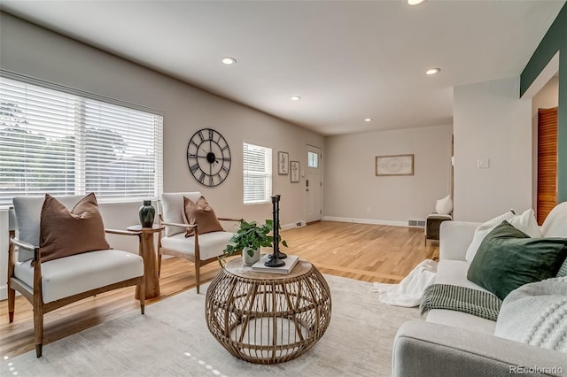 1060 Grove St, Denver, CO 80204 - living area with light wood-style floors and recessed lighting