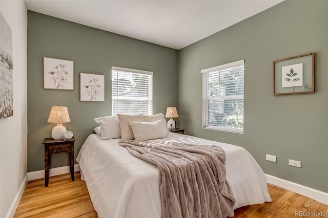 1060 Grove St, Denver, CO 80204 - bedroom with baseboards and light wood-style flooring