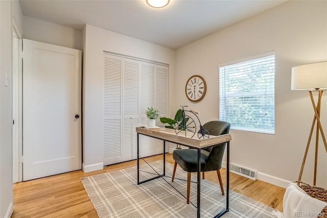 1060 Grove St, Denver, CO 80204 - office area with light wood-style floors and baseboards