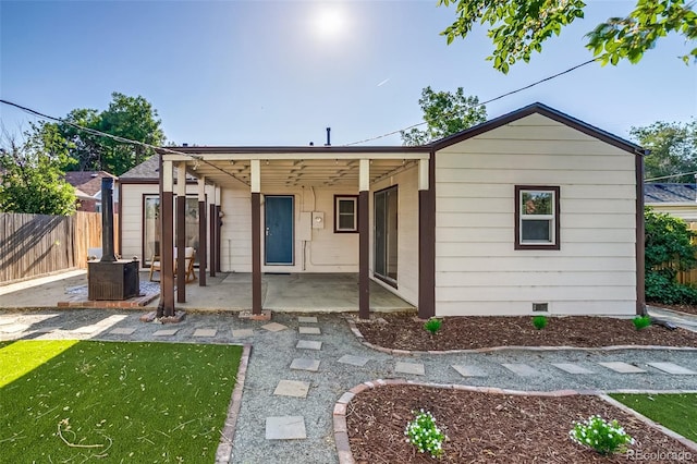 1060 Grove St, Denver, CO 80204 - view of front of property featuring a patio and crawl space