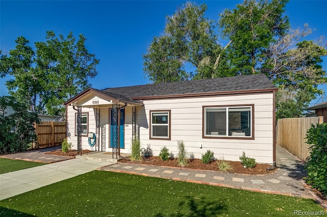 1060 Grove St, Denver, CO 80204 - view of front of property with a shingled roof