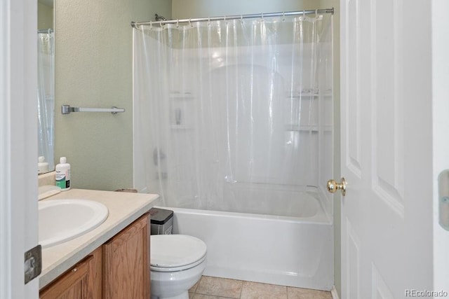 full bathroom featuring tile patterned floors, shower / bath combination with curtain, toilet, and vanity