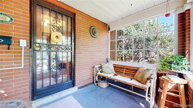 doorway to property featuring a porch