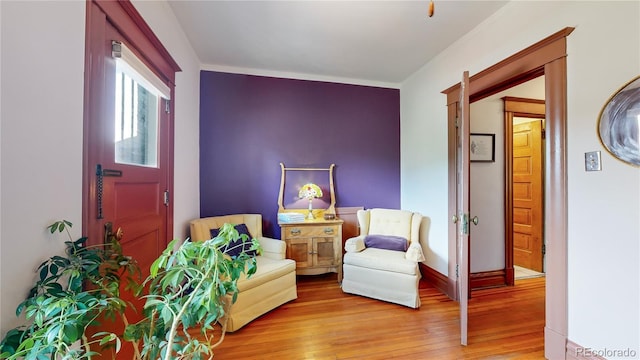 living area with light hardwood / wood-style floors