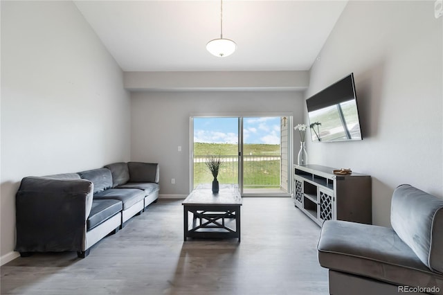 15700 E Jamison Dr Unit 305, Englewood, CO 80112 - living room featuring wood finished floors and baseboards
