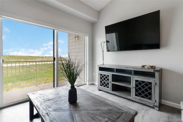 15700 E Jamison Dr Unit 305, Englewood, CO 80112 - living room with light wood-style floors and baseboards