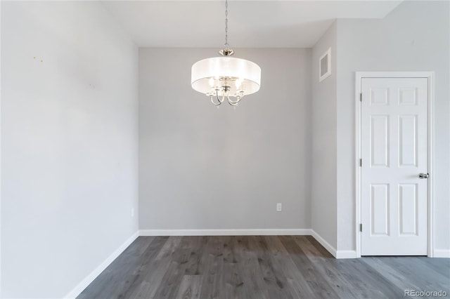 15700 E Jamison Dr Unit 305, Englewood, CO 80112 - empty room featuring a chandelier and wood finished floors