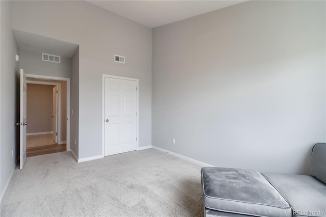 15700 E Jamison Dr Unit 305, Englewood, CO 80112 - sitting room with carpet floors and a towering ceiling
