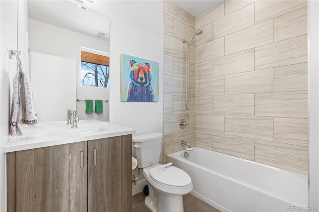 full bathroom featuring toilet,  shower combination, and vanity