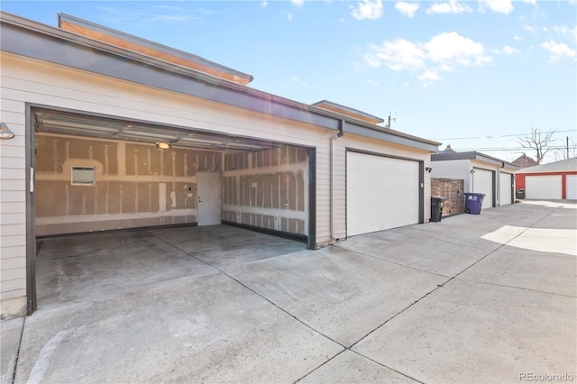 garage featuring driveway