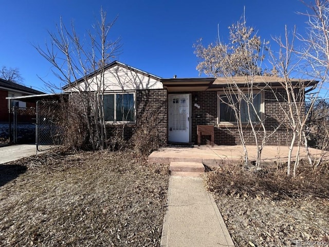 view of front facade featuring a carport