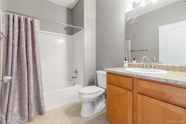 7130 Simms St Unit 206, Arvada, CO 80004 - bathroom featuring toilet, tile patterned floors, vanity, and shower / bath combination with curtain