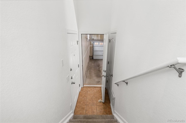 7130 Simms St Unit 206, Arvada, CO 80004 - stairs with tile patterned flooring and baseboards