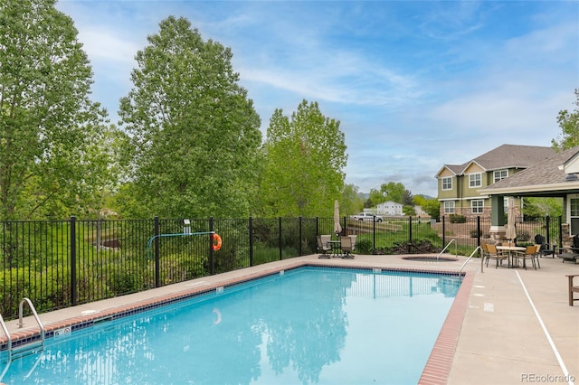 7130 Simms St Unit 206, Arvada, CO 80004 - community pool with a patio and a hot tub