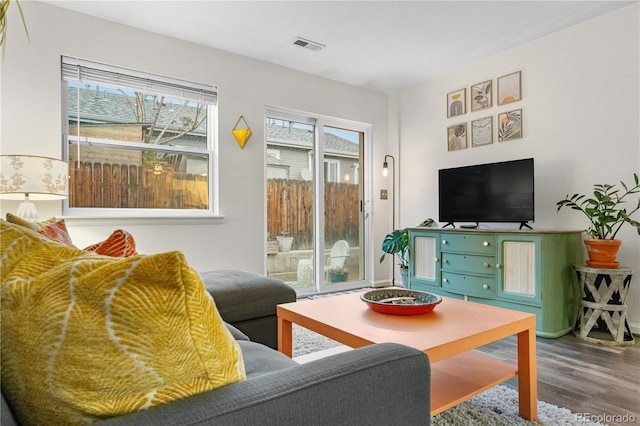 2985 W 46th Ave, Denver, CO 80211 - living room featuring plenty of natural light and wood finished floors