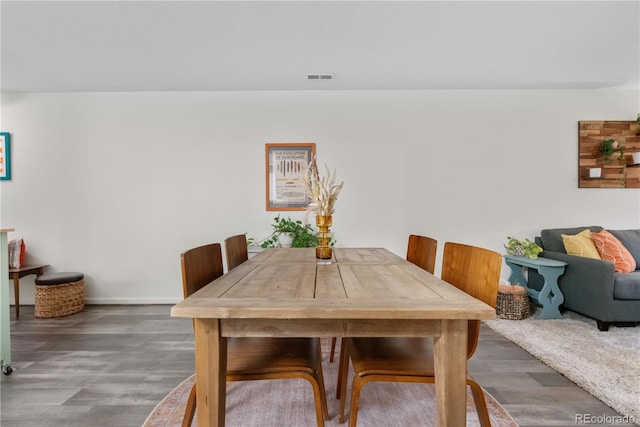 2985 W 46th Ave, Denver, CO 80211 - dining room featuring wood finished floors and baseboards