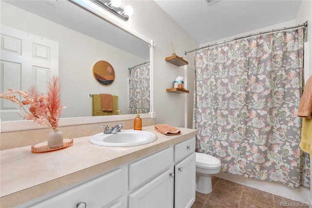 2985 W 46th Ave, Denver, CO 80211 - full bathroom featuring tile patterned floors, vanity, toilet, and a shower with curtain