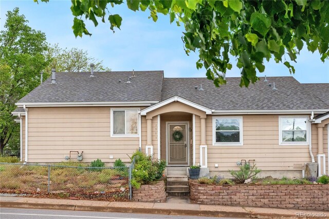 2985 W 46th Ave, Denver, CO 80211 - view of front of property featuring fence and roof with shingles