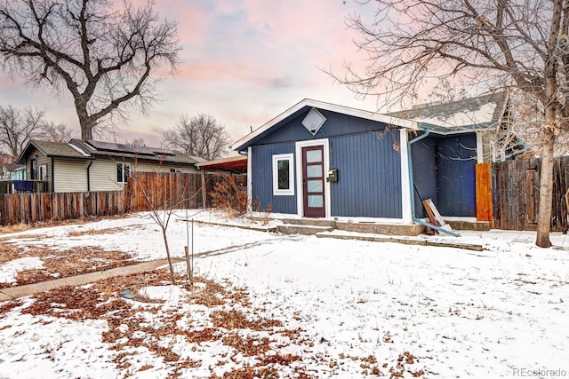 view of snow covered property