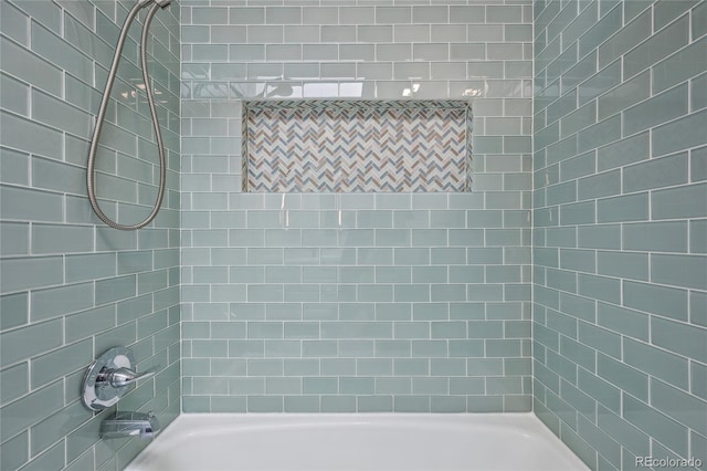 full bathroom with shower / washtub combination