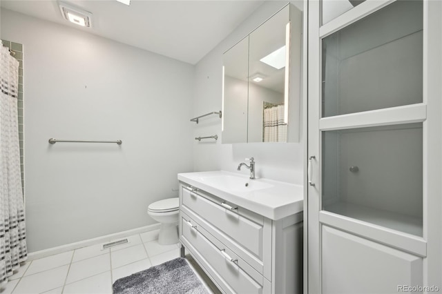 full bath featuring visible vents, vanity, baseboards, tile patterned floors, and toilet