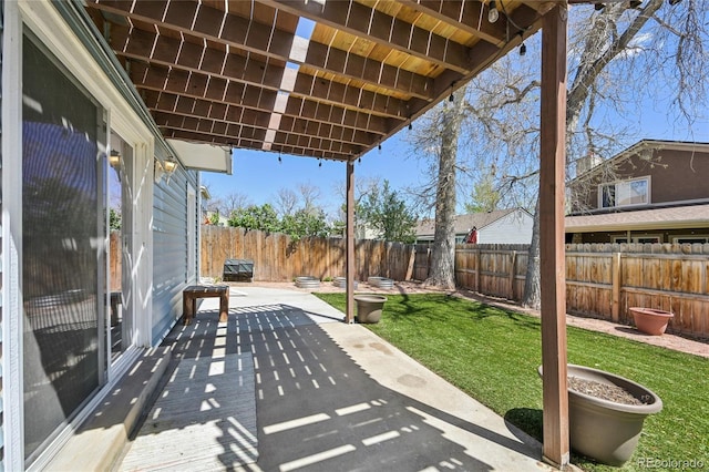 view of patio with a fenced backyard