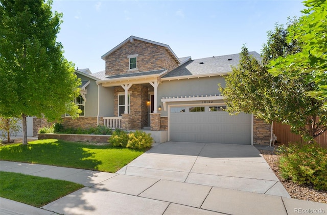 10122 Des Moines St, Parker, CO 80134 - view of front facade featuring stone siding, stucco siding, a garage, driveway, and a front yard