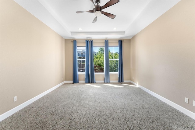 10122 Des Moines St, Parker, CO 80134 - carpeted spare room featuring a raised ceiling, a ceiling fan, and recessed lighting