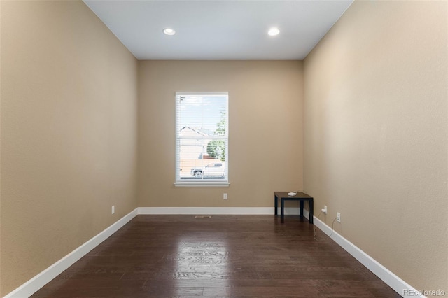 10122 Des Moines St, Parker, CO 80134 - spare room featuring dark wood-type flooring and recessed lighting