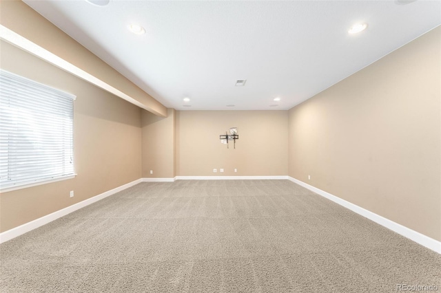 10122 Des Moines St, Parker, CO 80134 - empty room with recessed lighting and light carpet