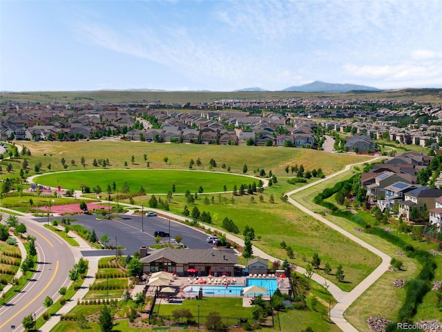 10122 Des Moines St, Parker, CO 80134 - aerial view of residential area featuring a pool and a mountain backdrop