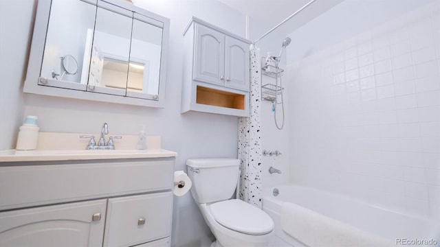 full bathroom featuring shower / tub combo, vanity, and toilet